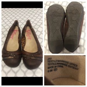 Worn once-brown fashionable flats